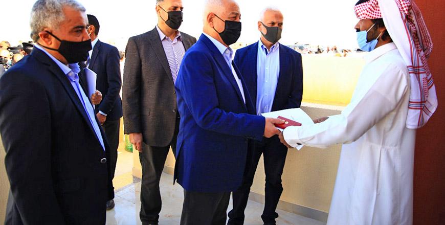 Issawi hands over housing units to underprivileged families in Aqaba and in Ma'an