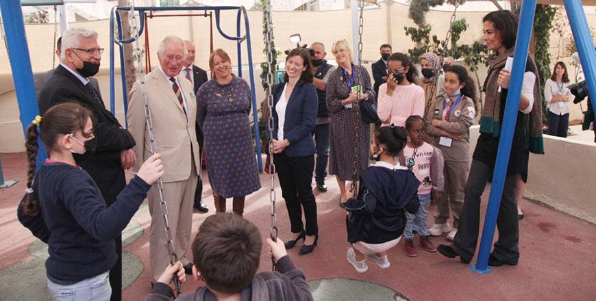 Prince Charles meets with community members, refugee families