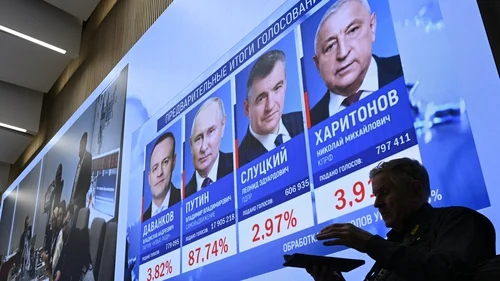Putin wins landslide re-election