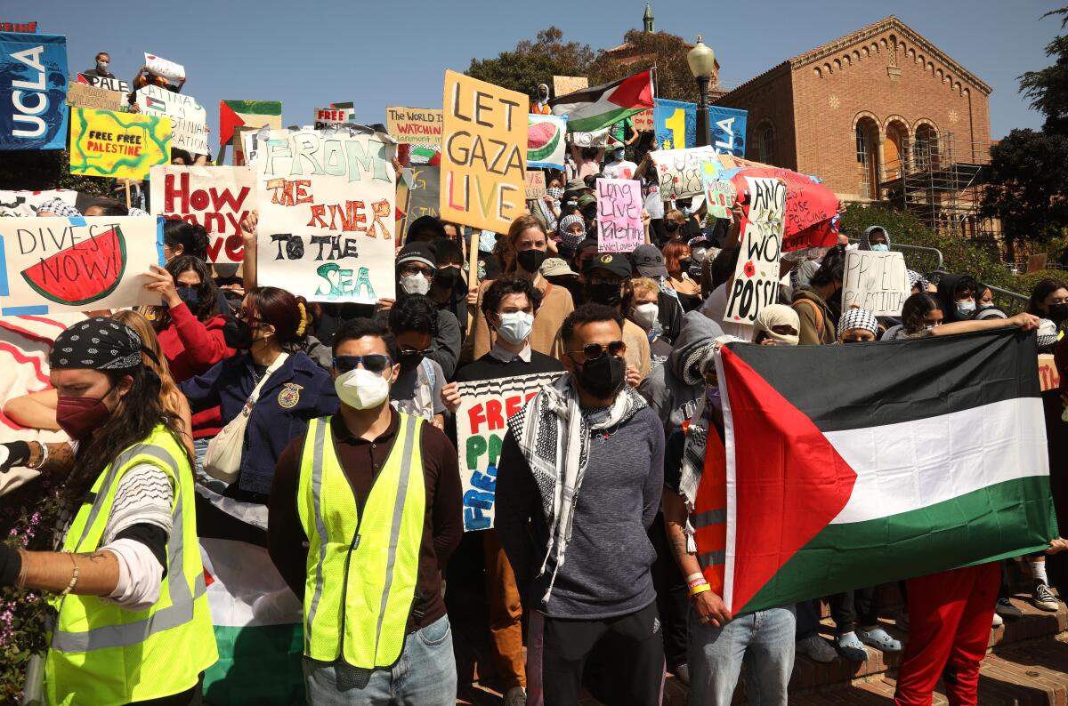 Police mass near UCLA pro-Palestinian protest camp, a day after violent clashes