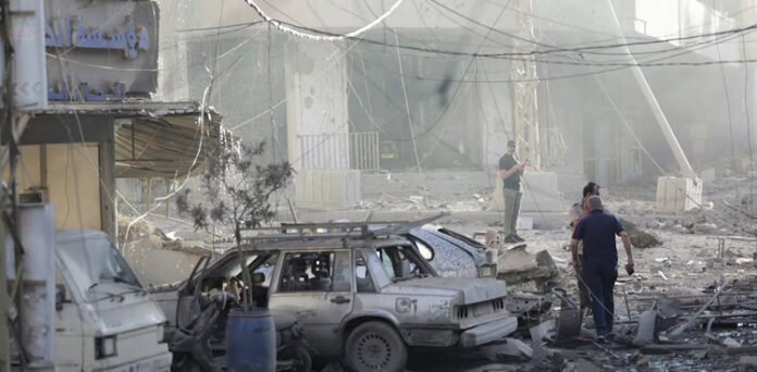 Israel targets Hezbollah intel HQ in Lebanon, Iran says it will not back down