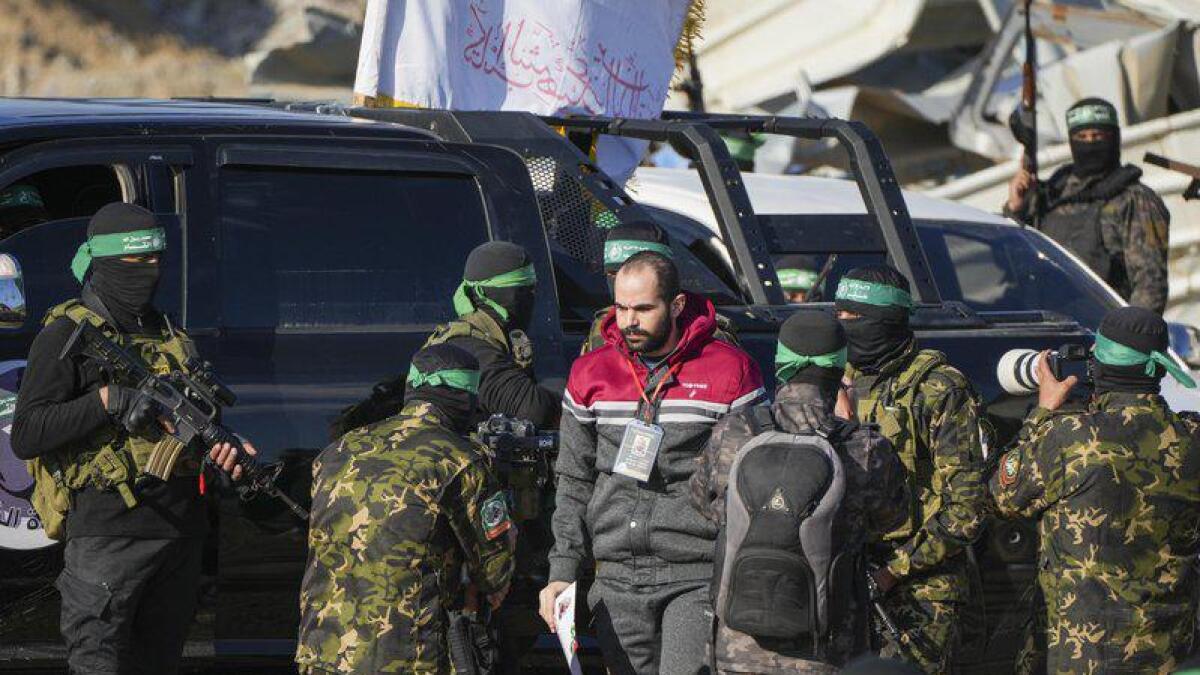 Three Israeli hostages released in latest Gaza exchange