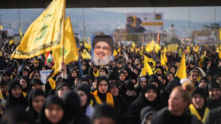 Tens of thousands mourn Hezbollah's slain leader Nasrallah in mass funeral