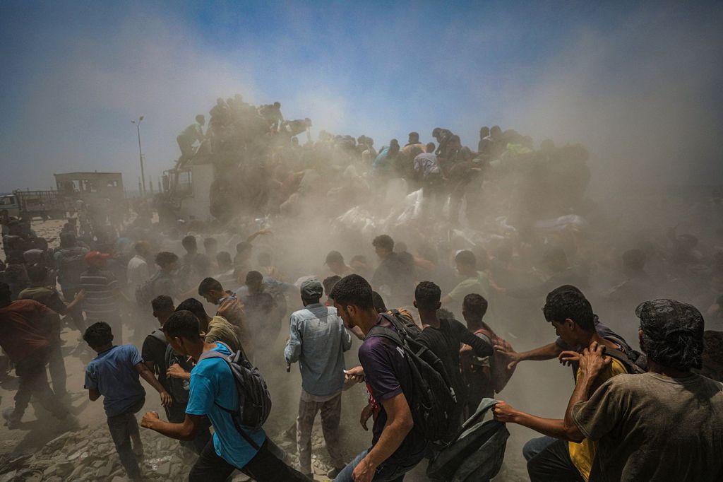 Hamas says it will allow aid for hostages if Israel halts airstrikes, opens permanent humanitarian corridors