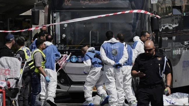 Palestinian gunmen kill six at Jerusalem bus stop