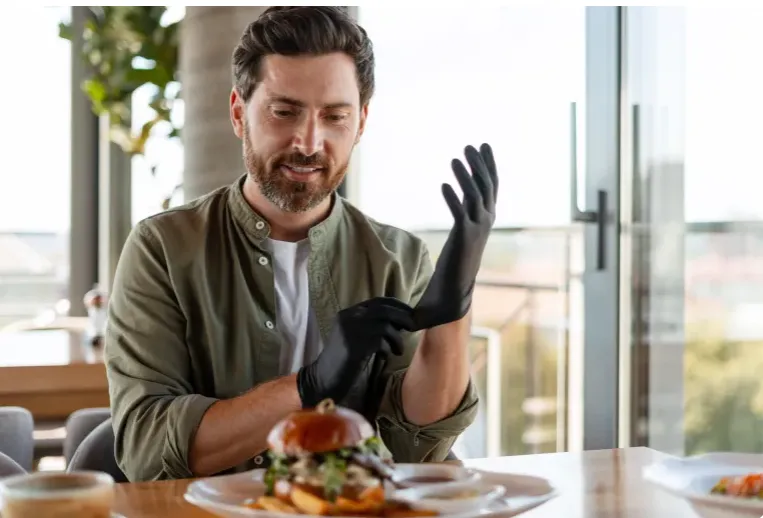 Health experts warn against eating with gloves on