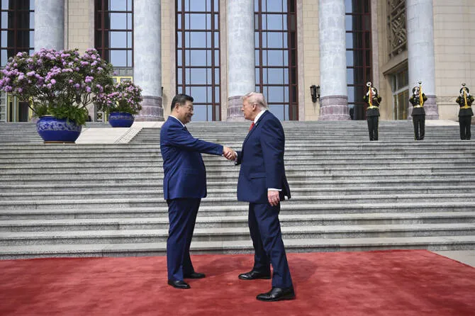 Trump and Xi meet for high-stakes talks in Beijing