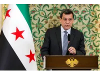 Head of Kurdish forces in Syria announces their dissolution after merging with army